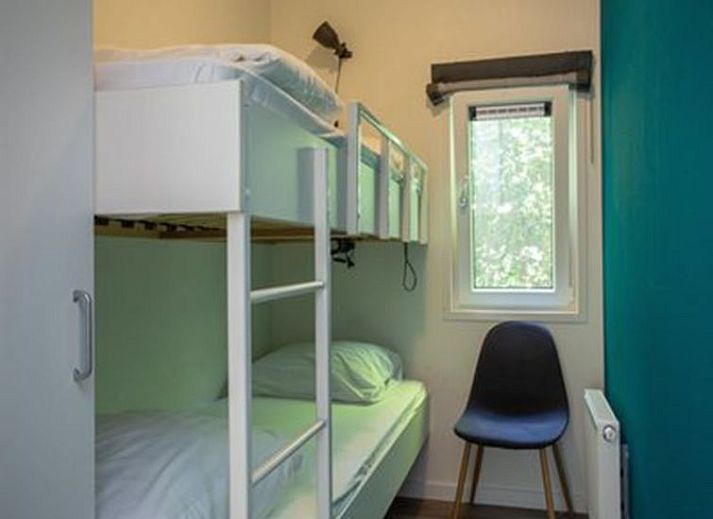 Gezellig terras bij Vakantiehuis De Thijmse Berg in Rhenen, ideaal voor ontspanning in de buitenlucht.