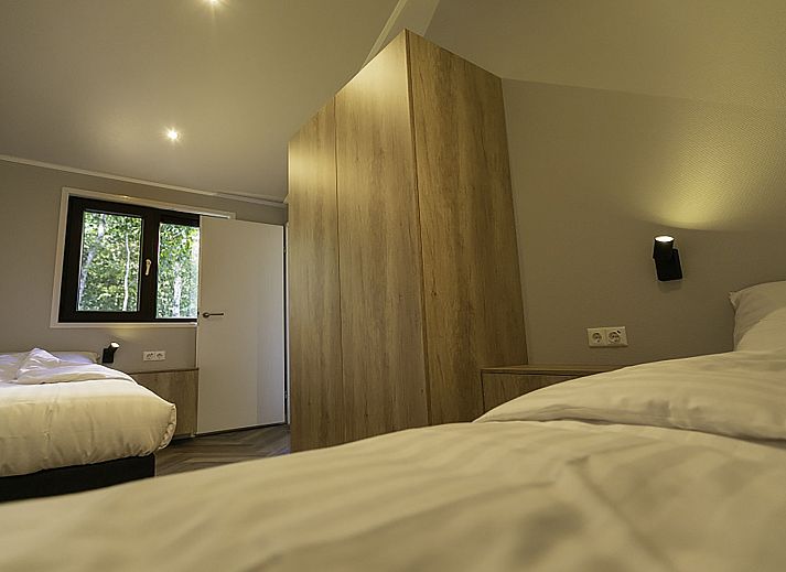 Cozy terrace at Holiday Home De Thijmse Berg, Rhenen, Utrechtse Heuvelrug ideal for family dinners.