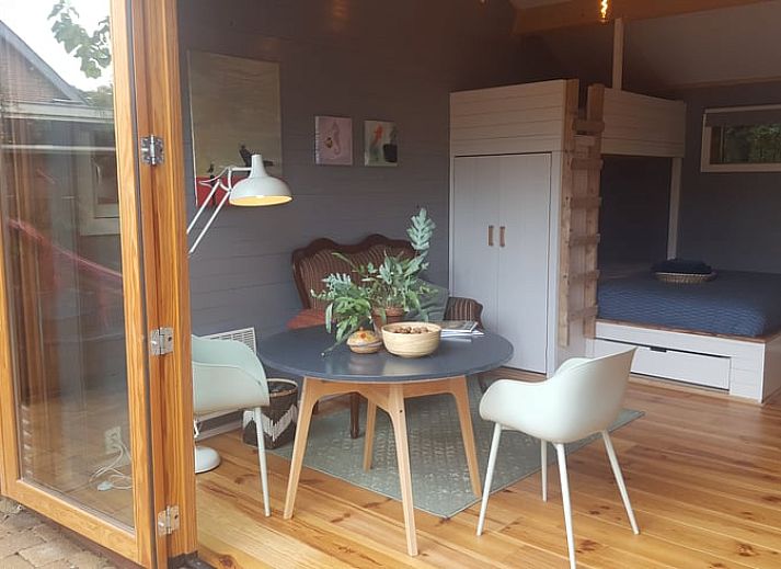 Gezellige tuin met terras bij Vakantiehuisje in Driebergen-Rijsenburg, Utrechtse Heuvelrug.