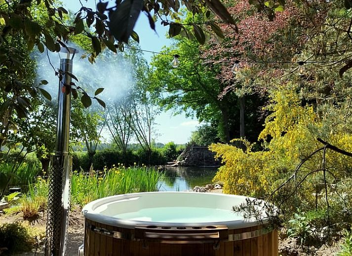 Huisje in Woudenberg omgeven door weelderige natuur op de Utrechtse Heuvelrug in Utrecht.