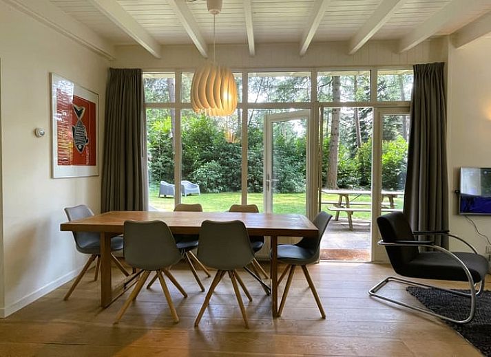 Vacation home in Maarn, Utrecht Hill Ridge, with sunny garden surrounded by wooded area.