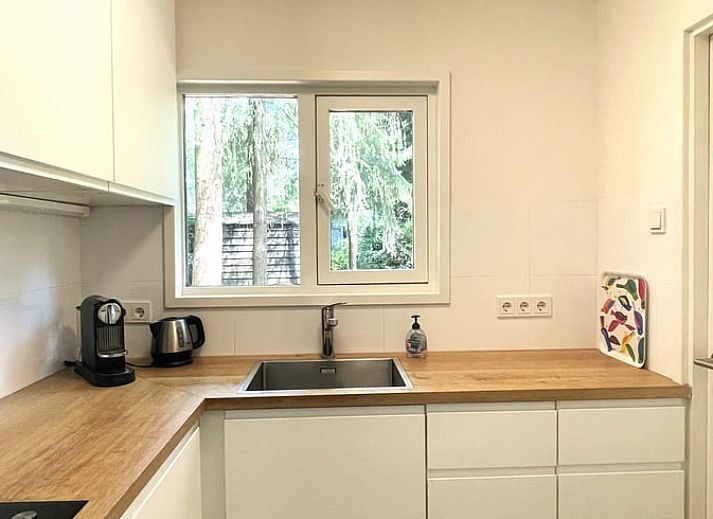 Rustic garden at Holiday home in Maarn, Utrecht Hill Ridge, ideal for relaxing in nature.