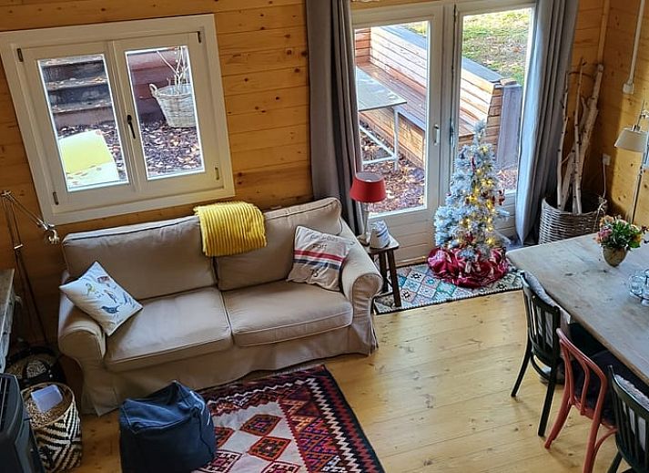 Cottage in Maarn, a charming vacation home on the Utrechtse Heuvelrug, surrounded by autumn leaves and serene nature in Maarn, Utrecht.