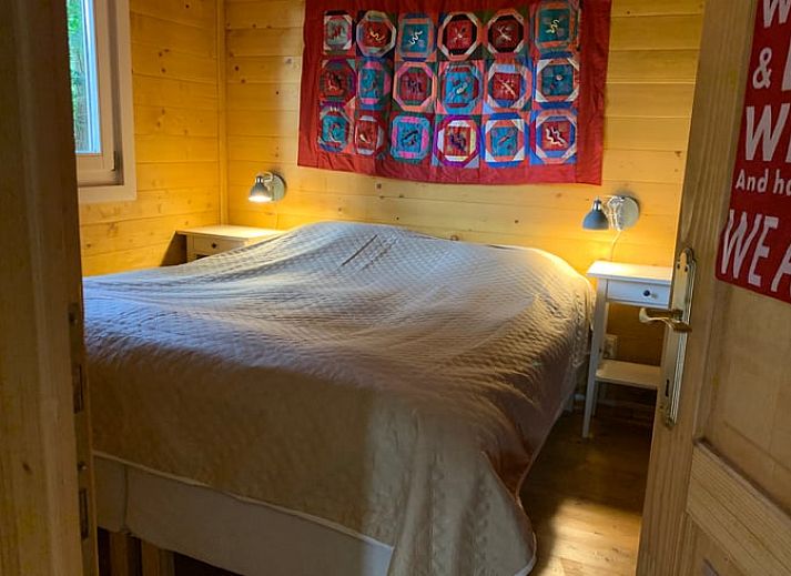 Cottage in Maarn, a vacation home in the Utrechtse Heuvelrug, surrounded by autumn trees and serene nature in Maarn, Utrecht.