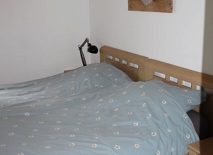 Cottage in Achterveld, ein charmantes Ferienhaus auf dem Utrechter Hoehenruecken in Utrecht, umgeben von laendlicher Umgebung und rustikaler Architektur.