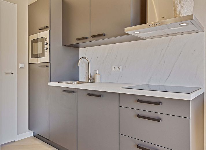 Kompaktes Ferienhaus Tiny house 2 Personen in Lexmond mit Blick auf die grne Umgebung.