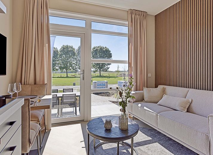 Kompaktes Ferienhaus Tiny house 2 Personen in Lexmond mit Blick auf die grne Umgebung.