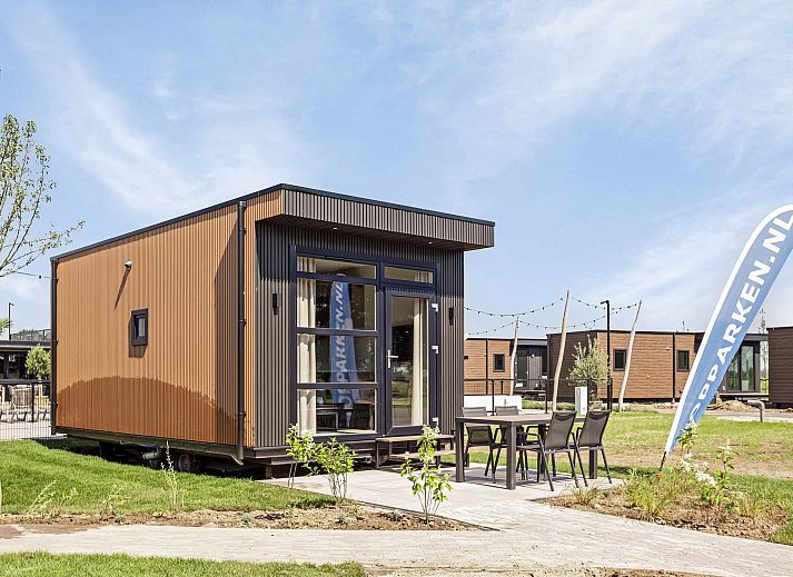 Kompaktes Ferienhaus Tiny house 2 Personen in Lexmond mit Blick auf die grne Umgebung.