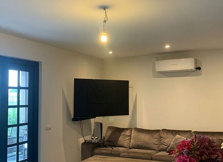 Cozy porch at cottage in Harmelen overlooking green area in Utrecht.