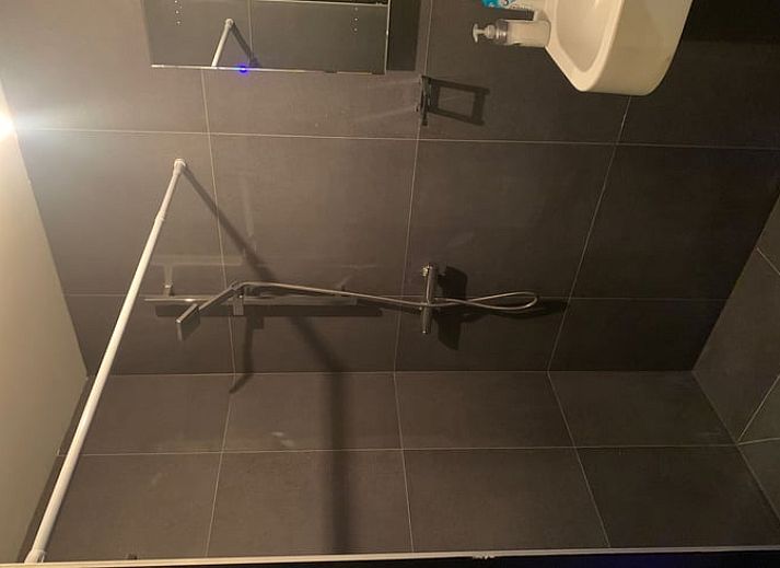 Cozy porch at cottage in Harmelen overlooking green area in Utrecht.