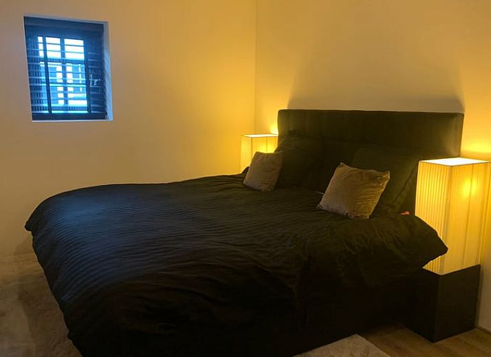 Cozy porch at cottage in Harmelen overlooking green area in Utrecht.