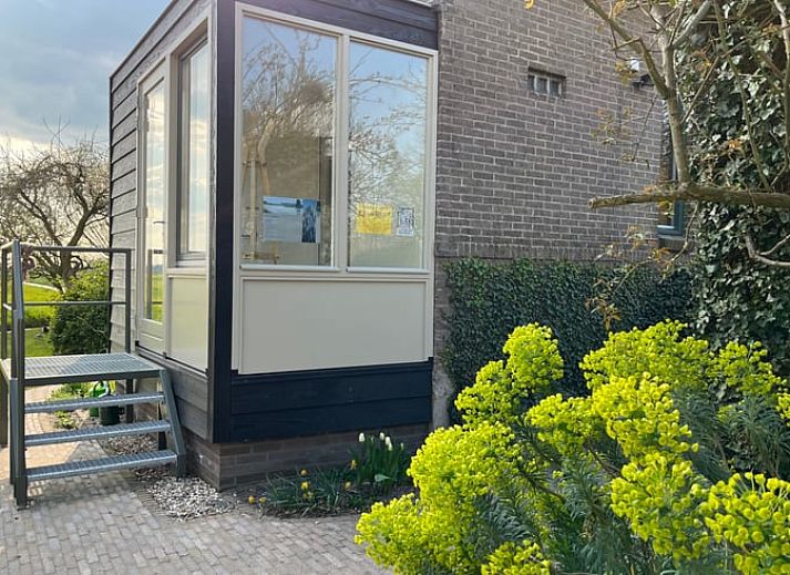 Ferienhaus in Schalkwijk, Utrecht, umgeben von einem ueppigen Garten und Natur, ideal fuer einen entspannten Aufenthalt in idyllischer Umgebung.