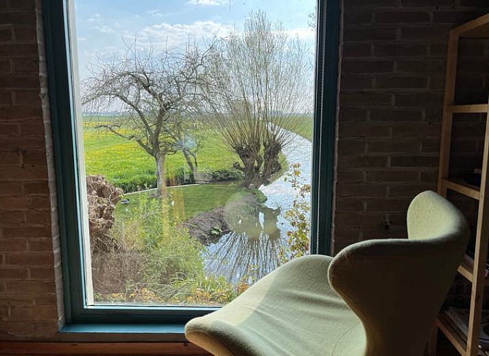 Ferienhaus in Schalkwijk, Utrecht, umgeben von einem ueppigen Garten und Natur, ideal fuer einen entspannten Aufenthalt in idyllischer Umgebung.