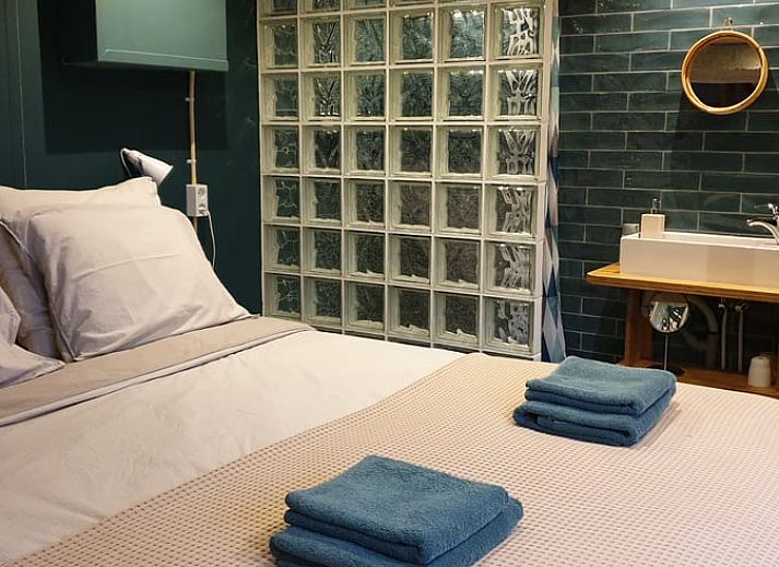 Ferienhaus in Schalkwijk, umgeben von einem ueppigen Garten und Natur, gelegen in der ruhigen Landschaft von Utrecht fuer einen erholsamen Urlaub.