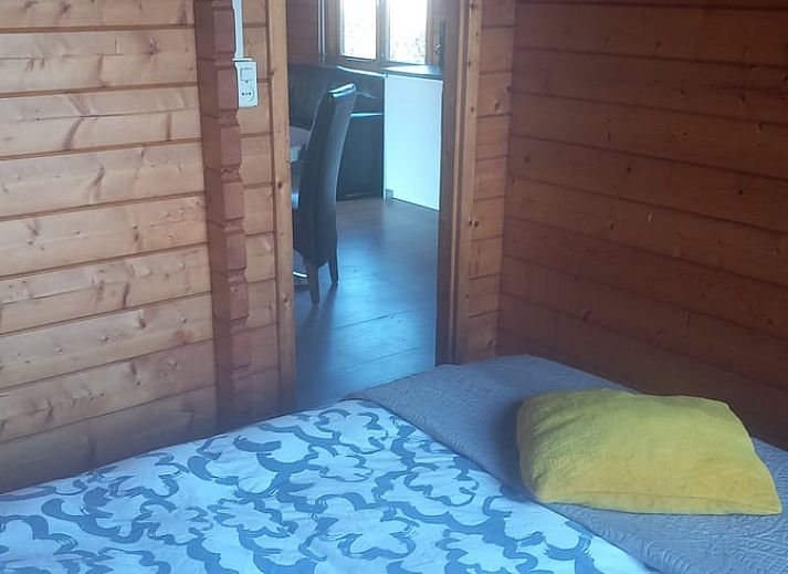 Gezellige woonkamer in Vakantiehuis in Wissenkerke, Noord-Beveland, met comfortabele zitplaatsen.