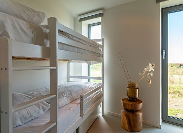 Dining area in Holiday home in Wissenkerke, Noord-Beveland, Zeeland with modern furnishings.