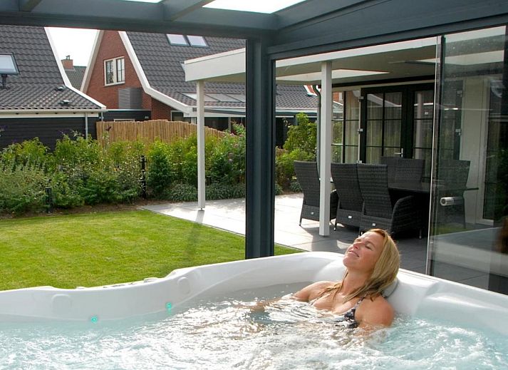 Coast Calm 71 vakantiehuis in Colijnsplaat met ruime tuin en trampoline.