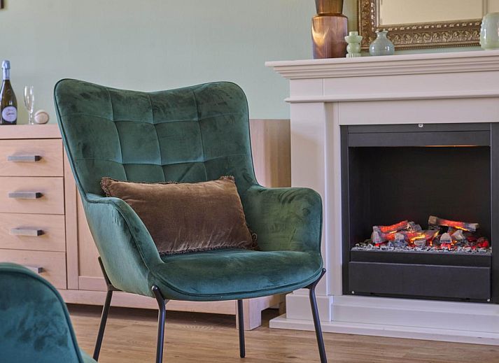 Charmant vakantiehuis Ocean Ease 49 in Colijnsplaat, Zeeland, met traditionele bakstenen gevel en moderne ramen.