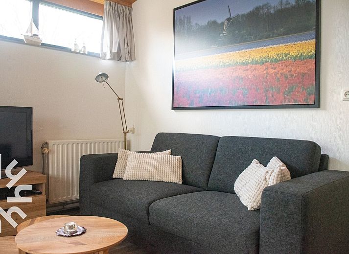 Wintergarten des Ferienhauses ZE1121 in Kamperland, Zeeland mit Gartenmoebeln.