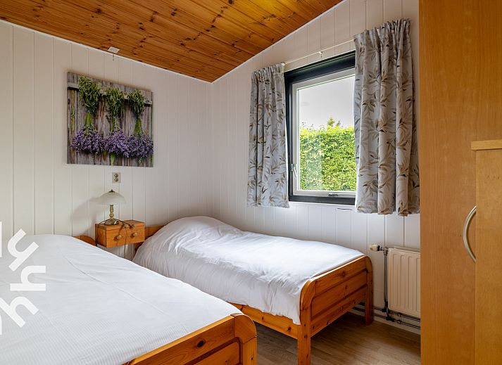 Wintergarten des Ferienhauses ZE1121 in Kamperland, Zeeland mit Gartenmoebeln.