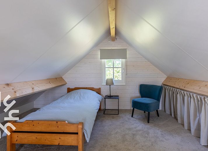 Knusse woonkamer in vakantiehuis ZE1208 in Kamperland, Noord-Beveland, met comfortabele bank.