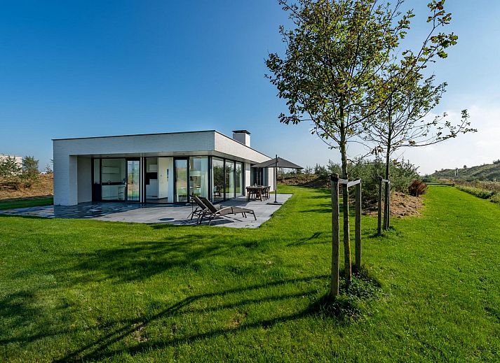 Stilvolle Essecke in Duinvallei 01, Bungalow in Kamperland, Zeeland mit grossen Fenstern.