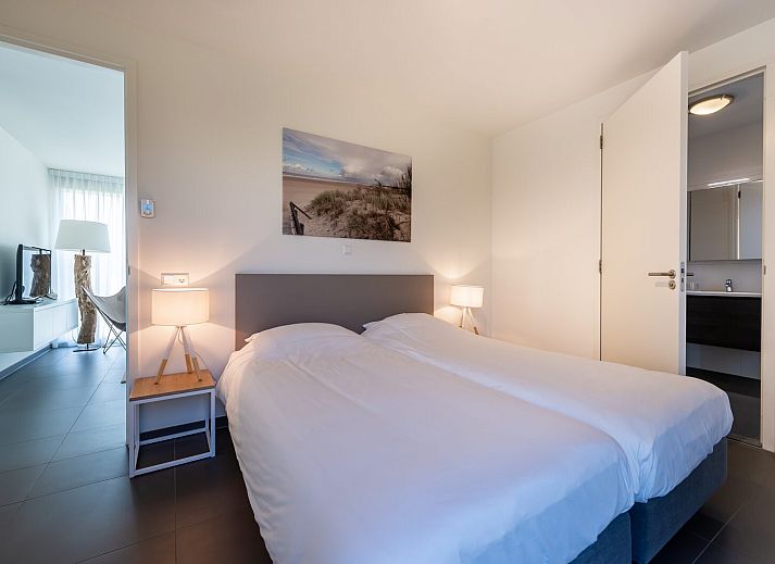 Duinvallei 01 in Kamperland, Zeeland, Ferienhaus inmitten einer verschneiten Landschaft.