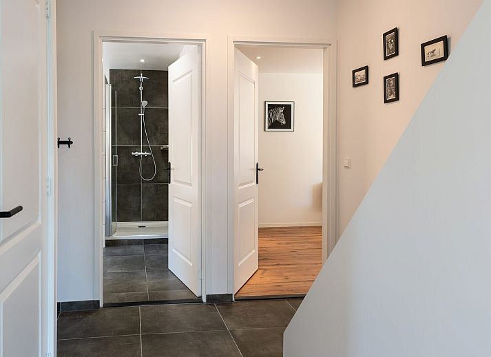 Lichte woonkamer in Zwanenlaan 26 | De Schotsman vakantiehuis in Kamperland, Zeeland.