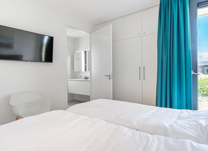 Moderne Sitzecke in Waterline 25 | De Groote Duynen, Ferienhaus in Kamperland, Noord-Beveland, mit bequemen Sofas.