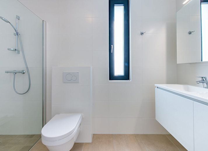 Moderne Sitzecke in Waterline 25 | De Groote Duynen, Ferienhaus in Kamperland, Noord-Beveland, mit bequemen Sofas.