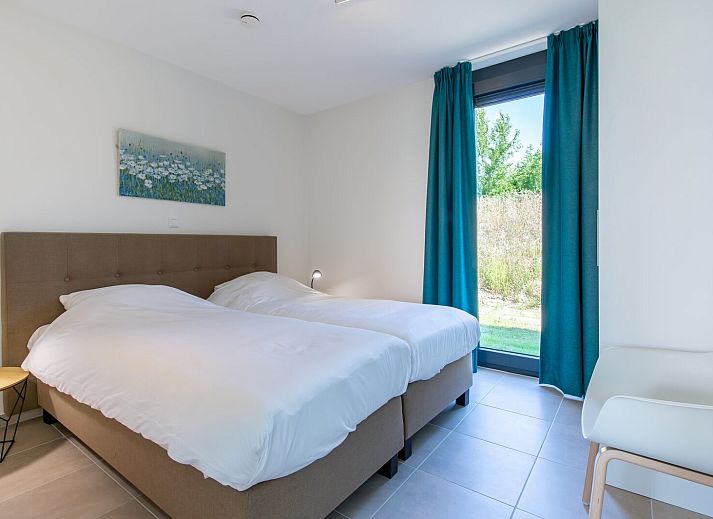 Offenes Wohnzimmer und Essbereich in Waterline 25 | De Groote Duynen, Ferienhaus in Kamperland, Noord-Beveland, mit viel Licht.