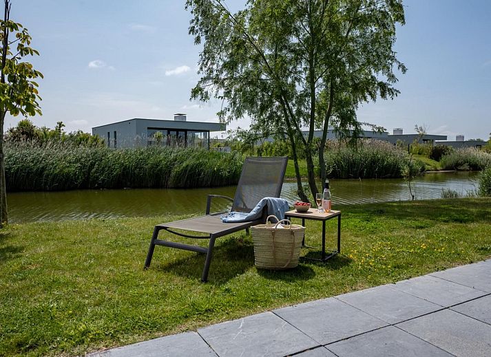 Gemuetliche Leseecke im Wohnzimmer des Ferienhauses Duinvallei 26, De Groote Duynen, Kamperland, in Noord-Beveland, Zeeland.