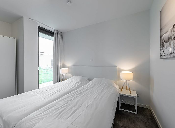 Stilvolles Wohnzimmer in Zandbank 03 | De Groote Duynen, Ferienhaus in Kamperland, mit Kamin und viel Tageslicht.