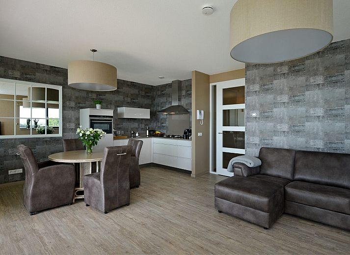 Stylish living room in vacation home Veerse Muze 7e, Kamperland, North Beveland, with beautiful views of Lake Veere.