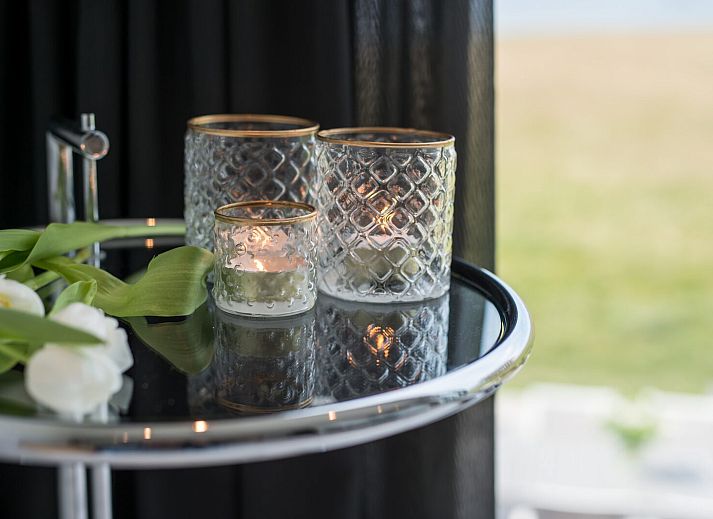 Sitzecke im Ferienhaus Havenweg 8, Kamperland, mit Blick auf das Wasser in Zeeland.