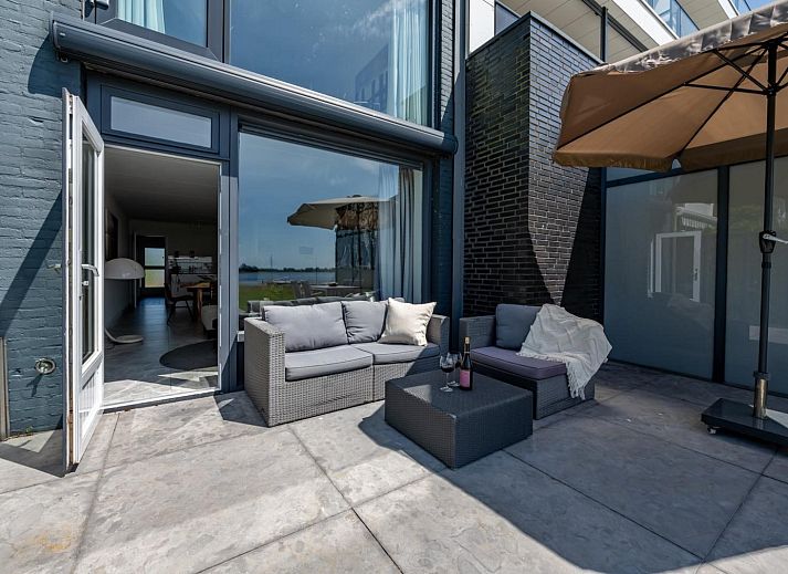 Stilvolles Wohnzimmer im Ferienhaus Havenweg 8, Kamperland, Noord-Beveland.