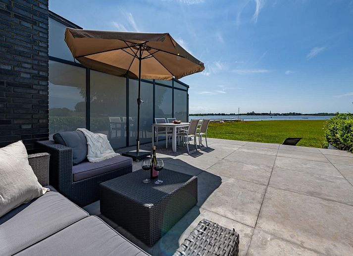 Stilvolles Wohnzimmer im Ferienhaus Havenweg 8, Kamperland, Noord-Beveland.