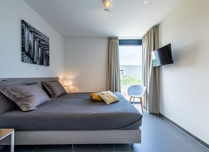 Sonnenterrasse des Ferienhauses Duinvallei 19 in De Groote Duynen, Kamperland mit Gartenblick