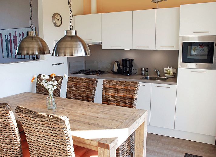 Cozy terrace with barbecue at Ostrea 16 vacation home, Roompot Beach Resort in Kamperland, Zeeland.