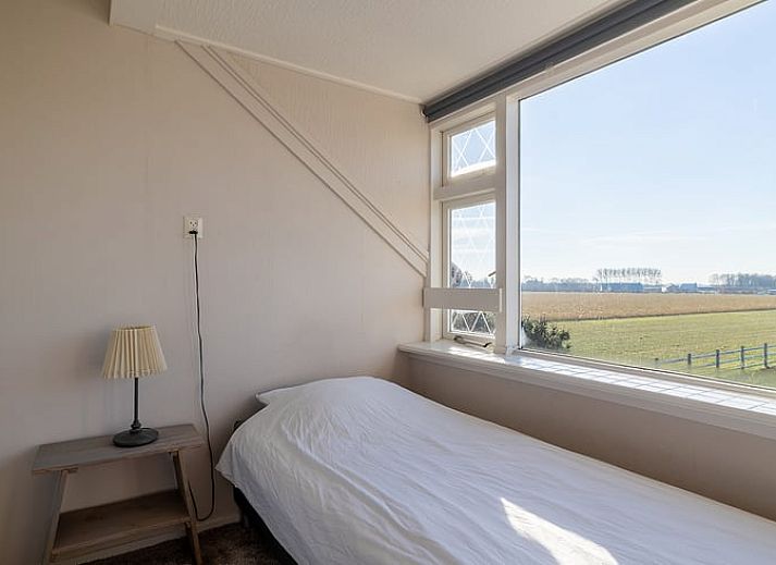 Vakantiehuisje in Kamperland met uitgestrekt uitzicht over de velden in Noord-Beveland, Zeeland.