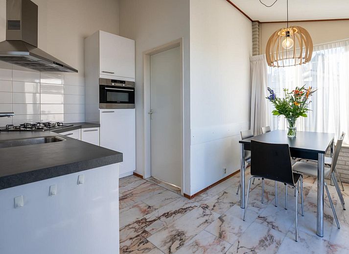 Gezellige woonkamer in Sophiaboulevard 15, Roompot Beach Resort te Kamperland, Zeeland. Comfortabele vakantiehuis inrichting.