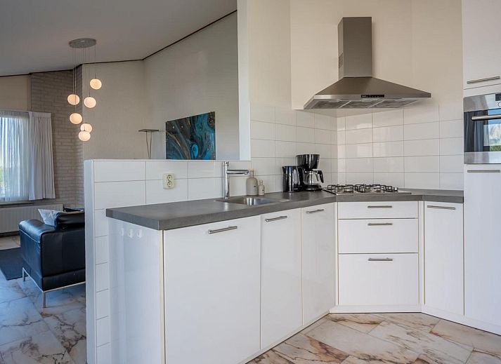 Gezellige woonkamer in Sophiaboulevard 15, Roompot Beach Resort te Kamperland, Zeeland. Comfortabele vakantiehuis inrichting.