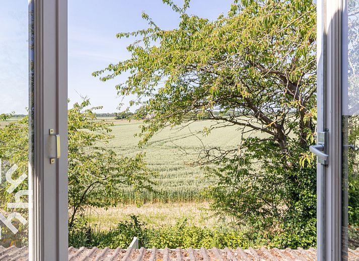 Gemuetliches Wohnzimmer mit Holzbalken im Ferienhaus ZE184, Kamperland, Noord-Beveland, Zeeland.