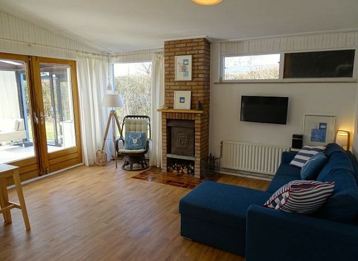 Zeeland-Lodge Ferienhaus in Kamperland mit gruenem Garten und charmanter Veranda in Nord-Beveland, Zeeland.