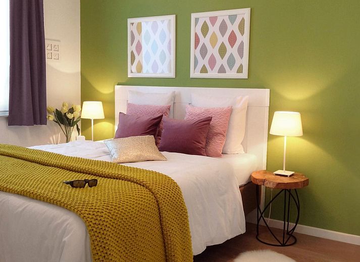 Picknicktisch und Grill im Garten des Ferienhauses VZ1178 in Kamperland, Nord-Beveland.