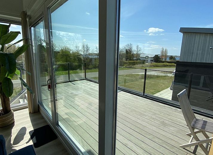 VZ948 Ferienvilla Kamperland, sonnige Dachterrasse mit Aussicht in Kamperland, Noord-Beveland, Zeeland.