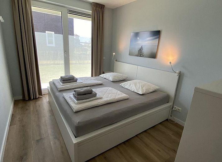 VZ948 Ferienvilla Kamperland, gemuetliches Wohnzimmer mit viel Licht in Kamperland, Noord-Beveland, Zeeland.