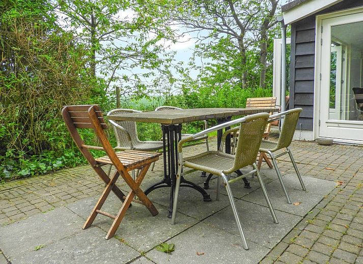 Gemuetliche Sitzecke mit Kamin in VZ184 Ferienhaus Kamperland, Zeeland.