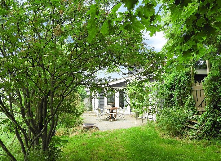 Gemuetliche Sitzecke mit Kamin in VZ184 Ferienhaus Kamperland, Zeeland.