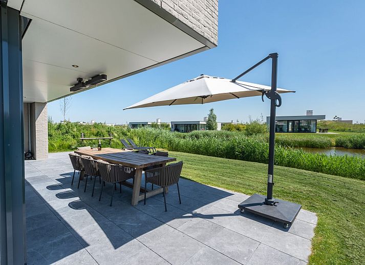 Gemuetliche Sitzecke mit Kamin in Duinvallei 08, Ferienhaus in Kamperland, Noord-Beveland, Zeeland.